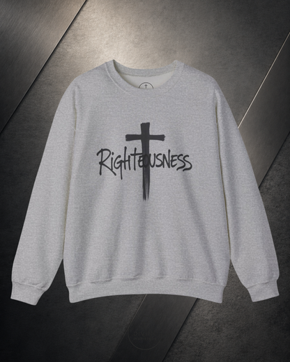 Gray sweatshirt with a black cross and 'Righteousness' text on a dark surface