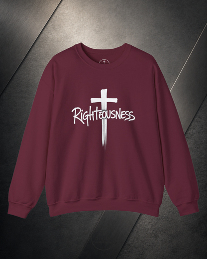 Maroon sweatshirt with a white cross and 'Righteousness' text on a dark surface