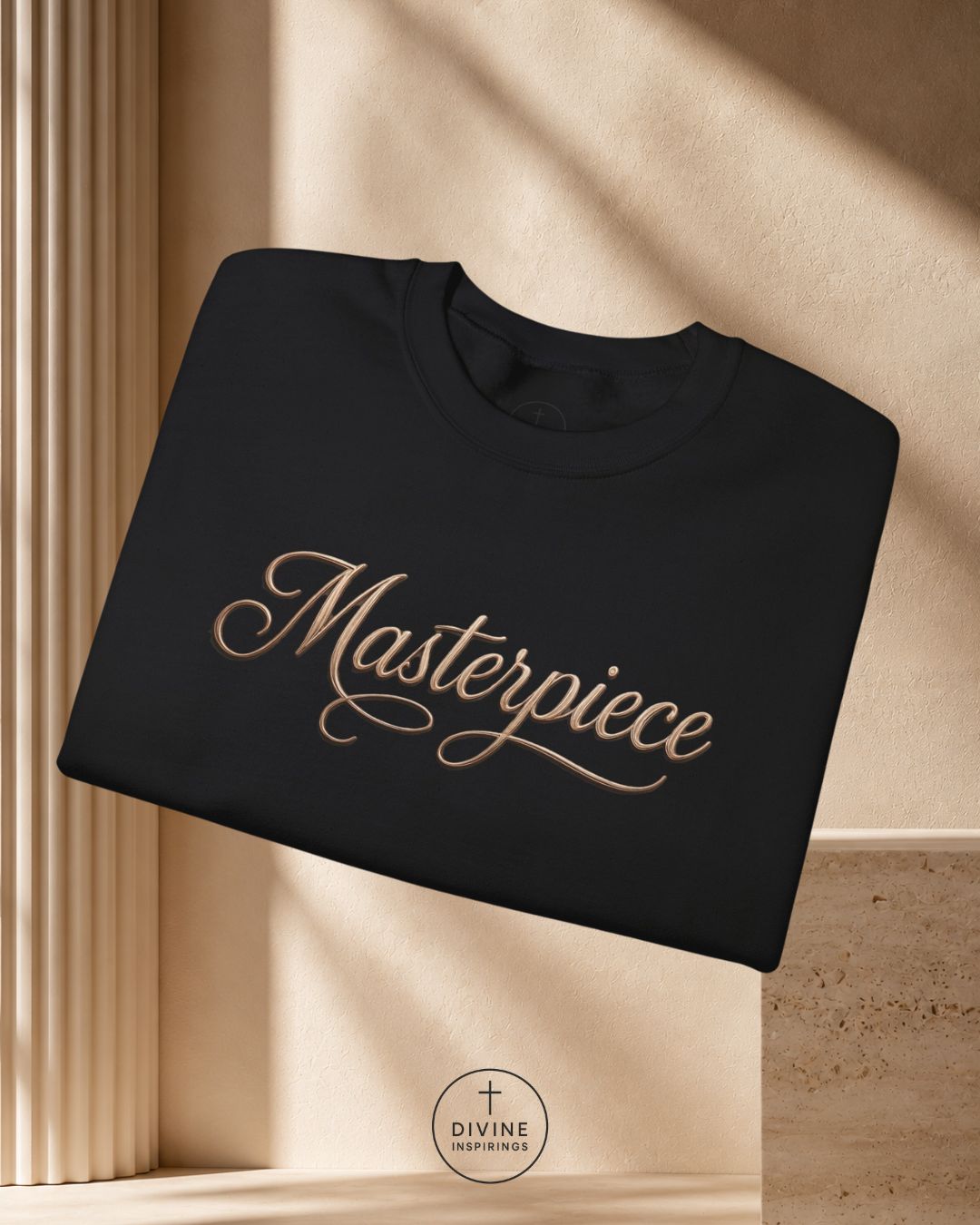 Black sweatshirt with 'Masterpiece' text on a beige background