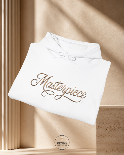 White pouch with 'Masterpiece' text on a beige background