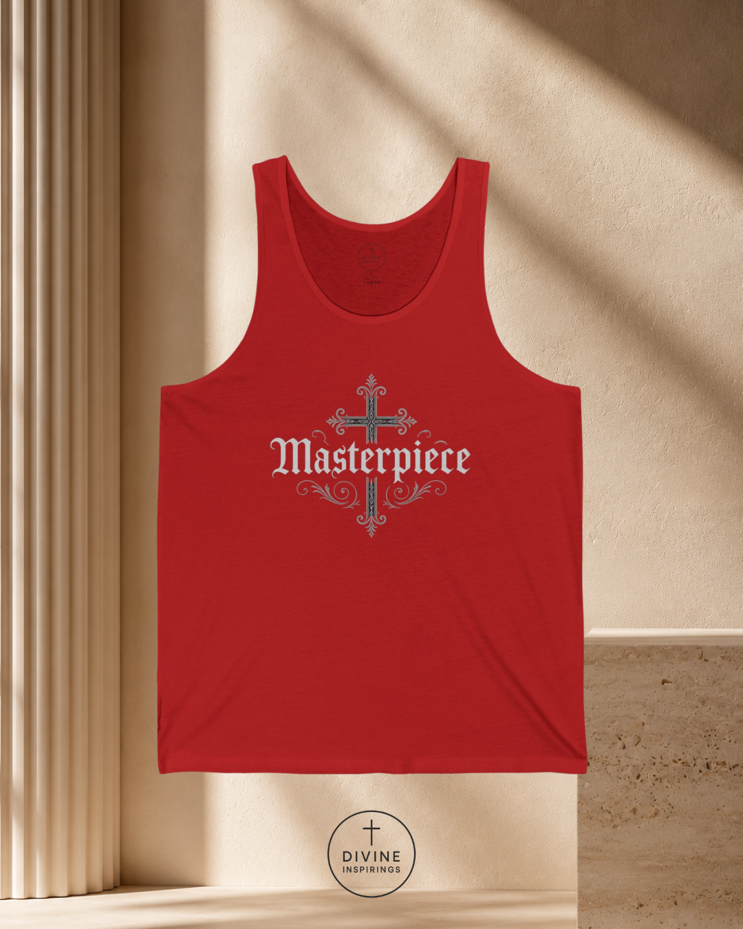 Red tank top with 'Masterpiece' text on a beige background