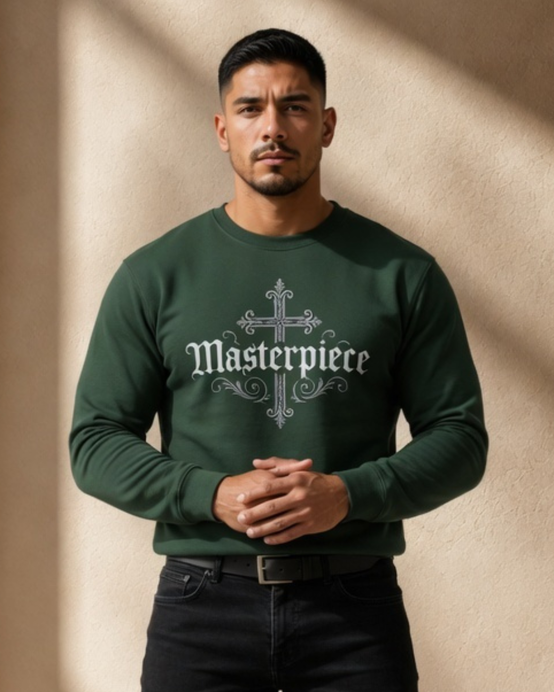 Man wearing a green sweatshirt with 'Masterpiece' text against a beige background