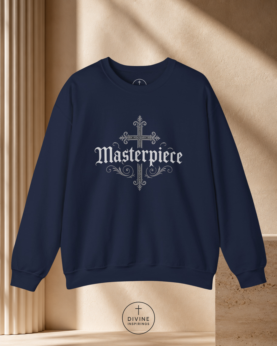 Navy blue sweatshirt with 'Masterpiece' text on a beige background