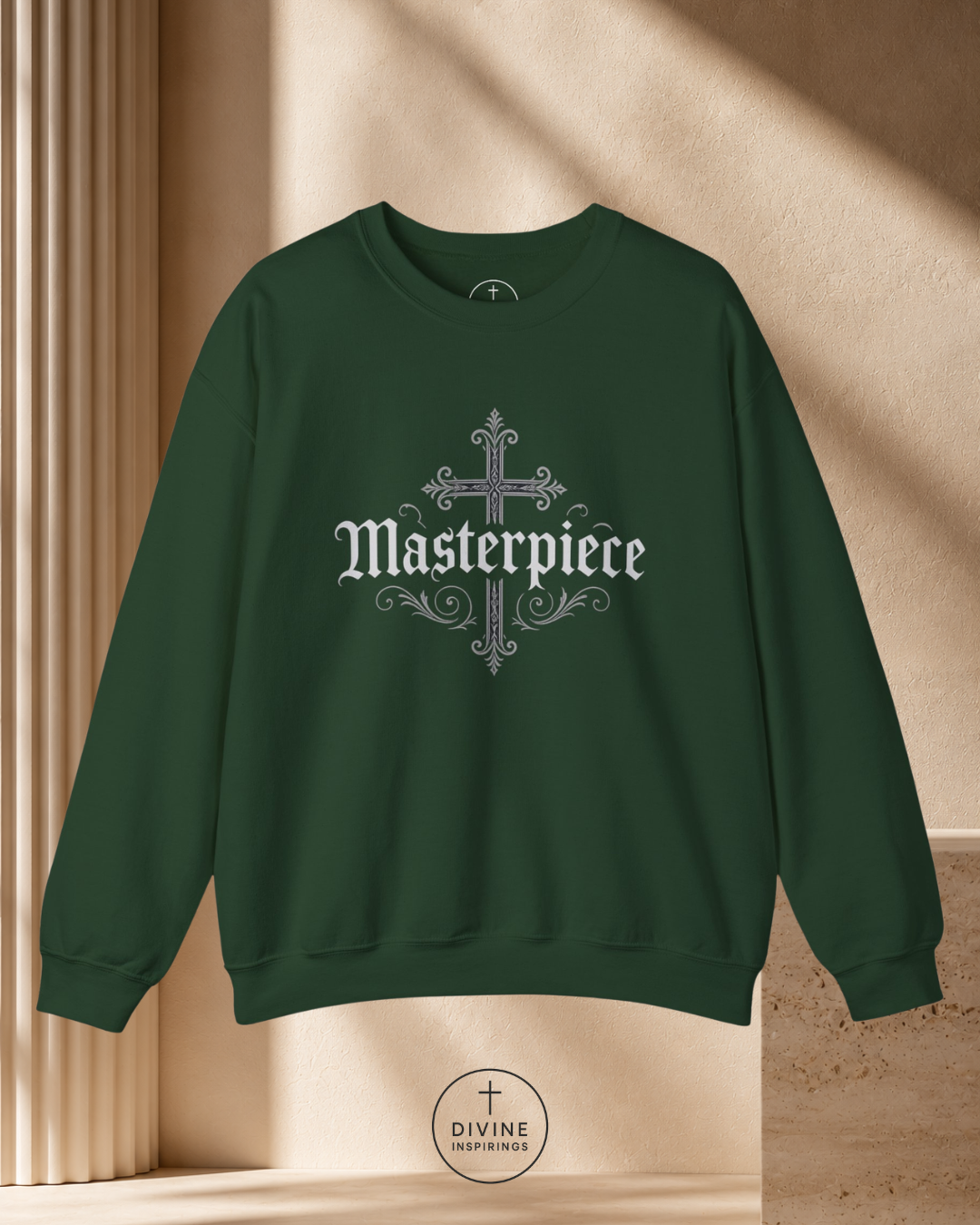 Green sweatshirt with 'Masterpiece' design on a beige background