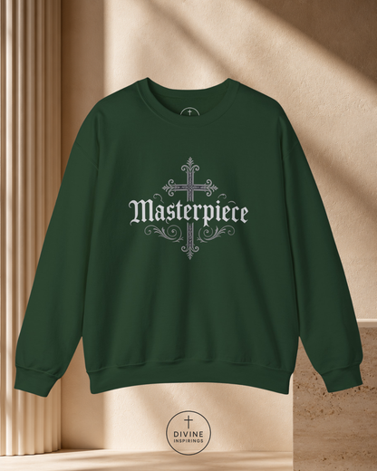 Green sweatshirt with 'Masterpiece' design on a beige background