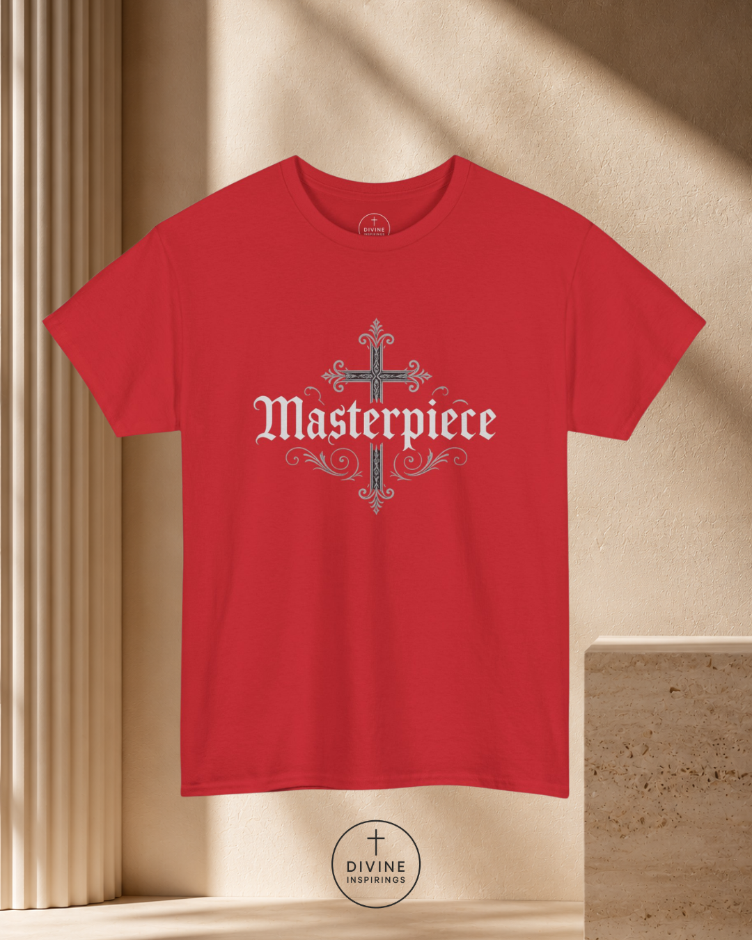 Red t-shirt with 'Masterpiece' design on a beige background