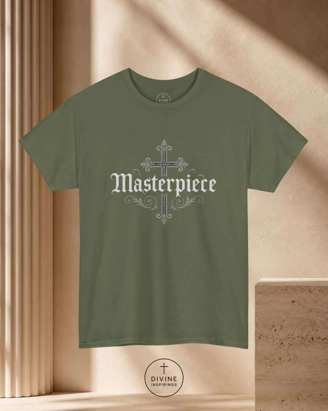 Green t-shirt with 'Masterpiece' design on a beige background