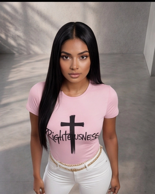 Woman wearing a pink t-shirt with a black cross and 'Righteousness' text against a neutral background