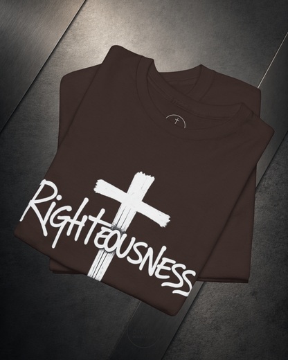 Brown sweatshirt with a white cross and 'Righteousness' text on a dark surface