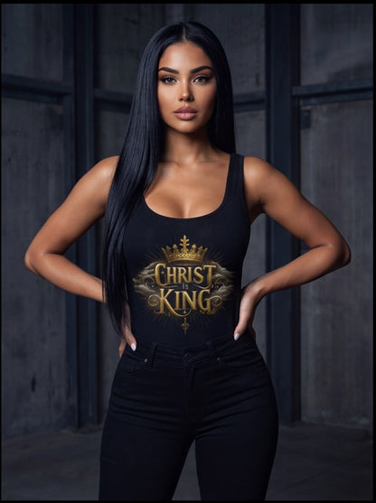 Woman wearing a black tank top with 'Christ is King' design against a dark background