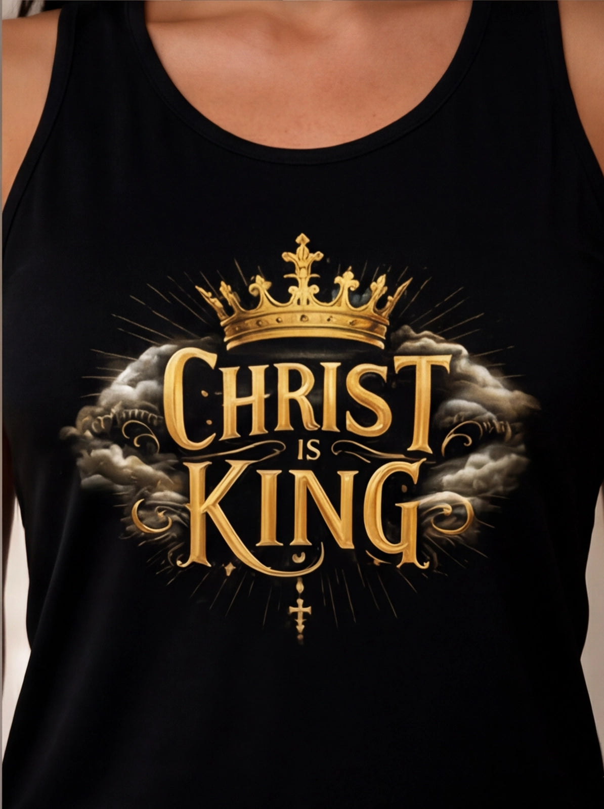 Black tank top with 'Christ is King' text and crown design.