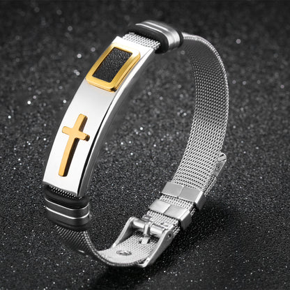 Metallic bracelet with a cross charm on a dark background