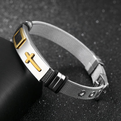 Bracelet with gold cross on a dark textured background