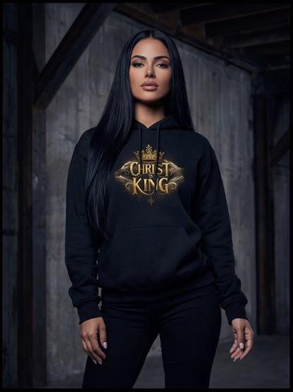 Person wearing a black hoodie with 'Christ King' text in gold.