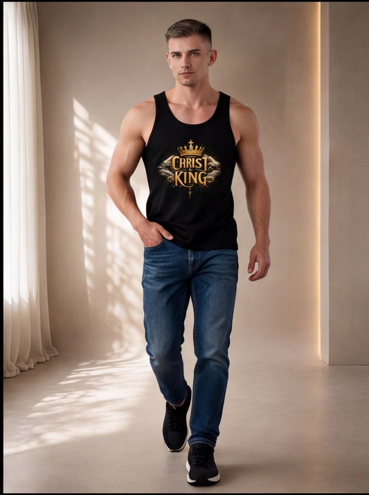 Man wearing a black tank top with 'Christ King' text and blue jeans in a well-lit room.
