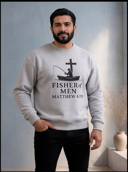 Man wearing a gray sweatshirt with a 'Fisher of Men' design and text, standing against a neutral background.