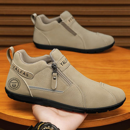 Beige casual shoes with a visible brand logo on a wooden surface