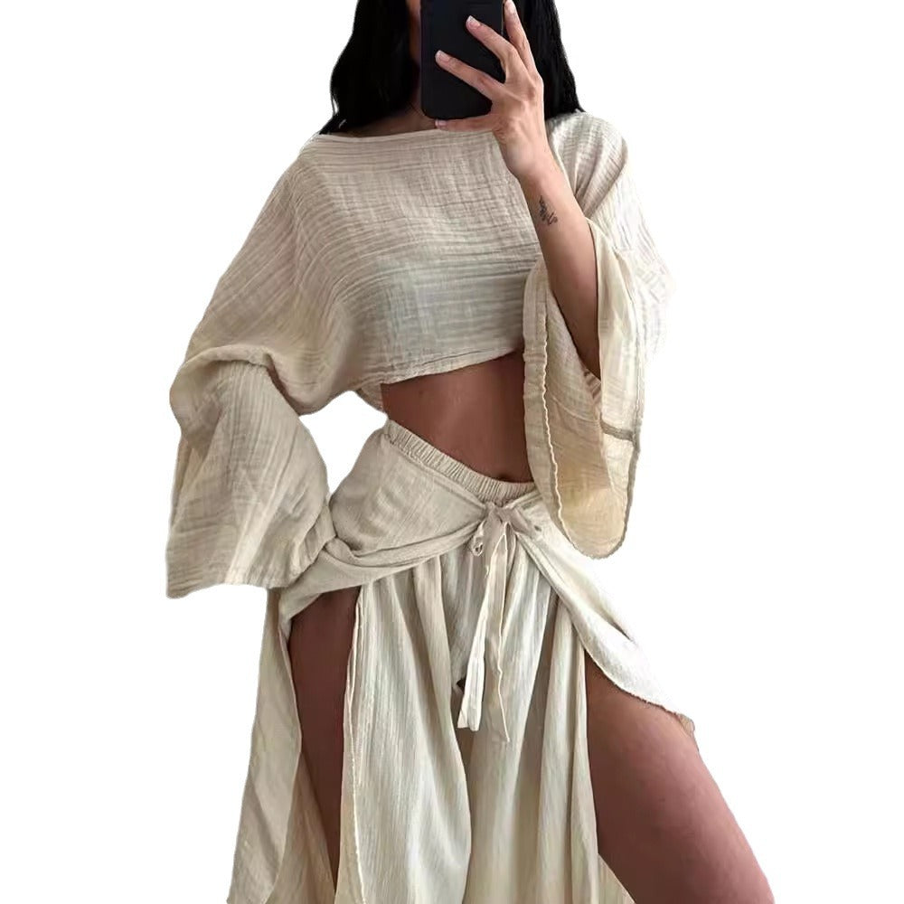 Person wearing a beige outfit with a white background