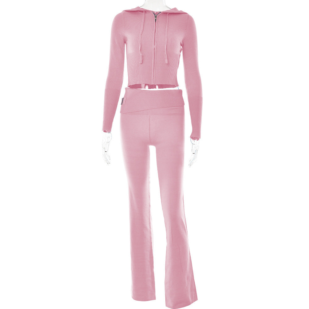 Pink tracksuit on a mannequin against a white background