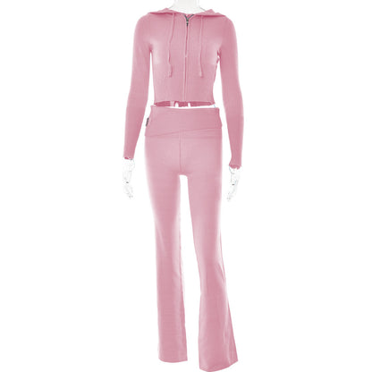 Pink tracksuit on a mannequin against a white background