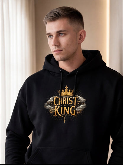 Man wearing a black hoodie with 'Christ King' text and crown graphic.