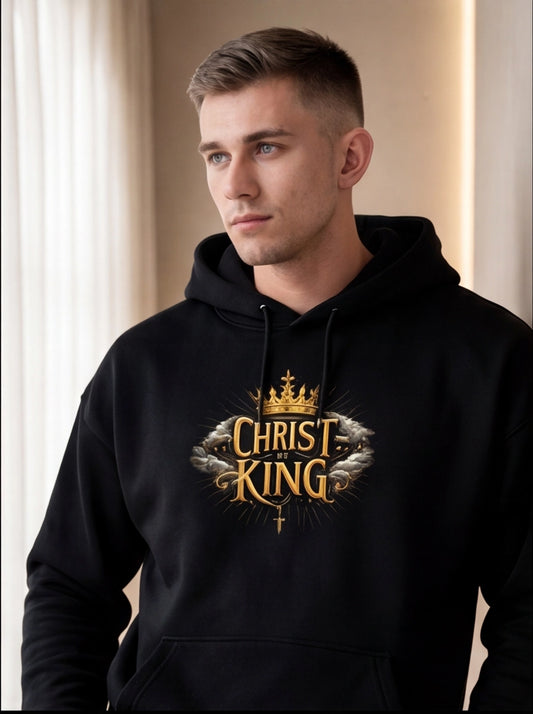 Man wearing a black hoodie with 'Christ King' text and crown graphic.