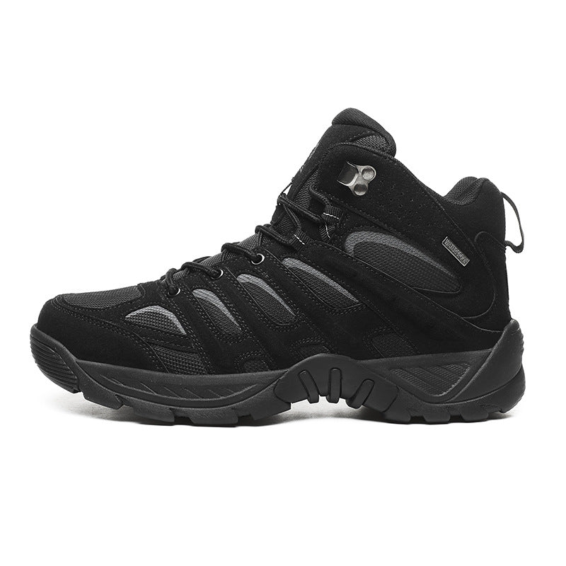 Black hiking boot with gray accents on a white background
