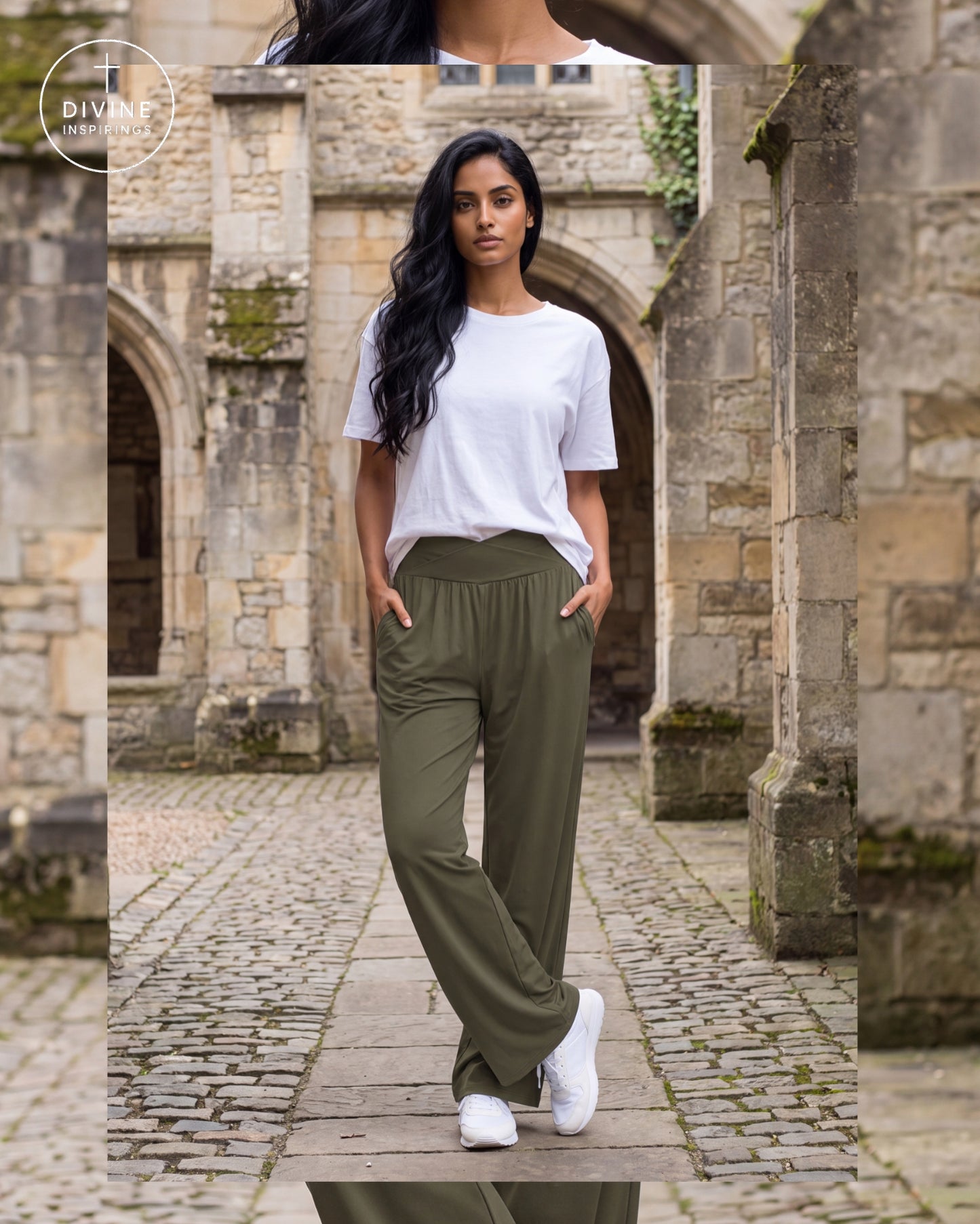 A woman stands in a stone courtyard wearing olive green wide-leg pants, a white t-shirt, and white sneakers. A circular 'Divine Inspirings' brand logo is visible in the top-left corner.