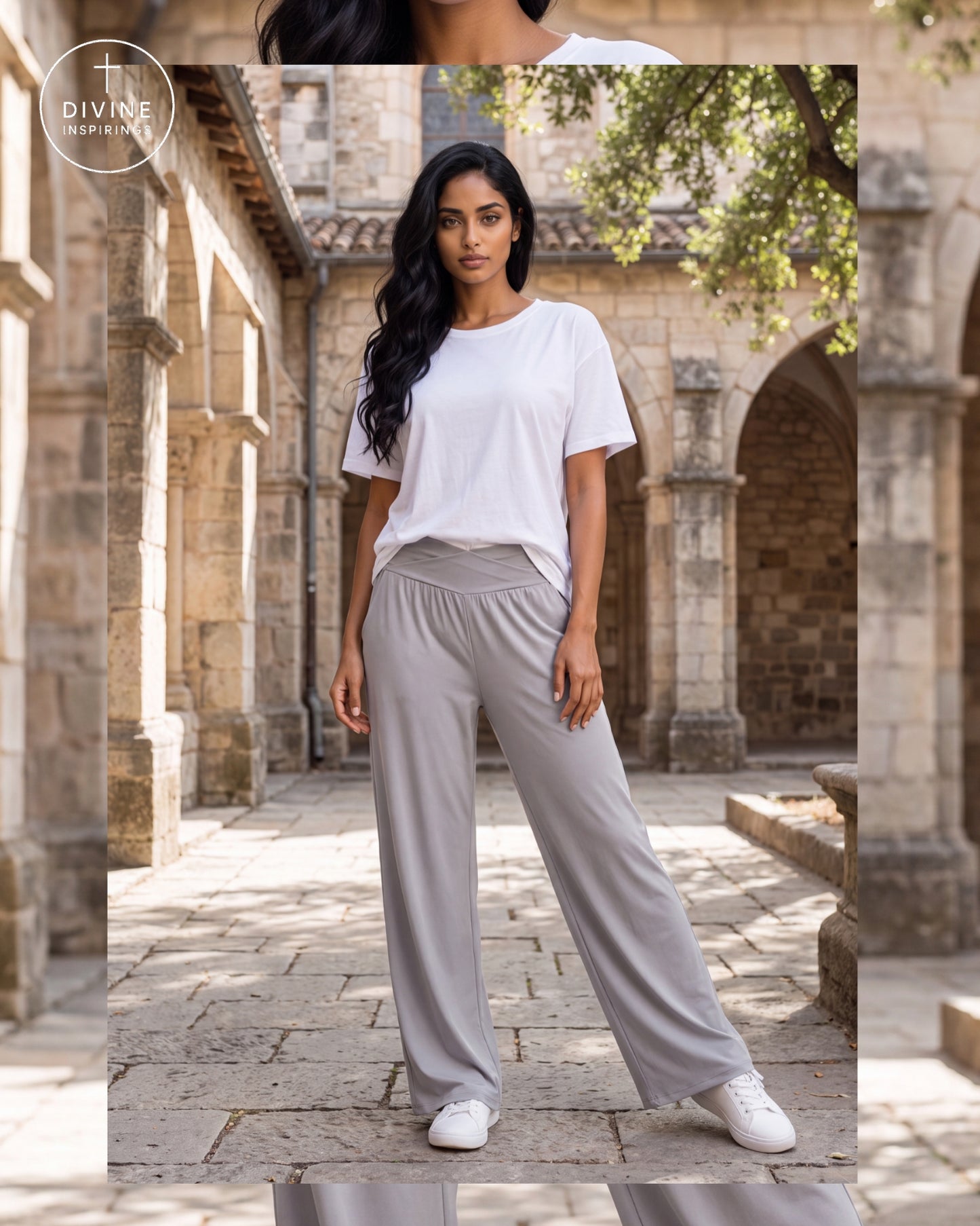 A woman stands in a stone courtyard wearing a white short-sleeve crewneck t-shirt and light gray wide-leg lounge pants with white sneakers. A circular 'Divine Inspirings' logo is visible in the top-left corner.