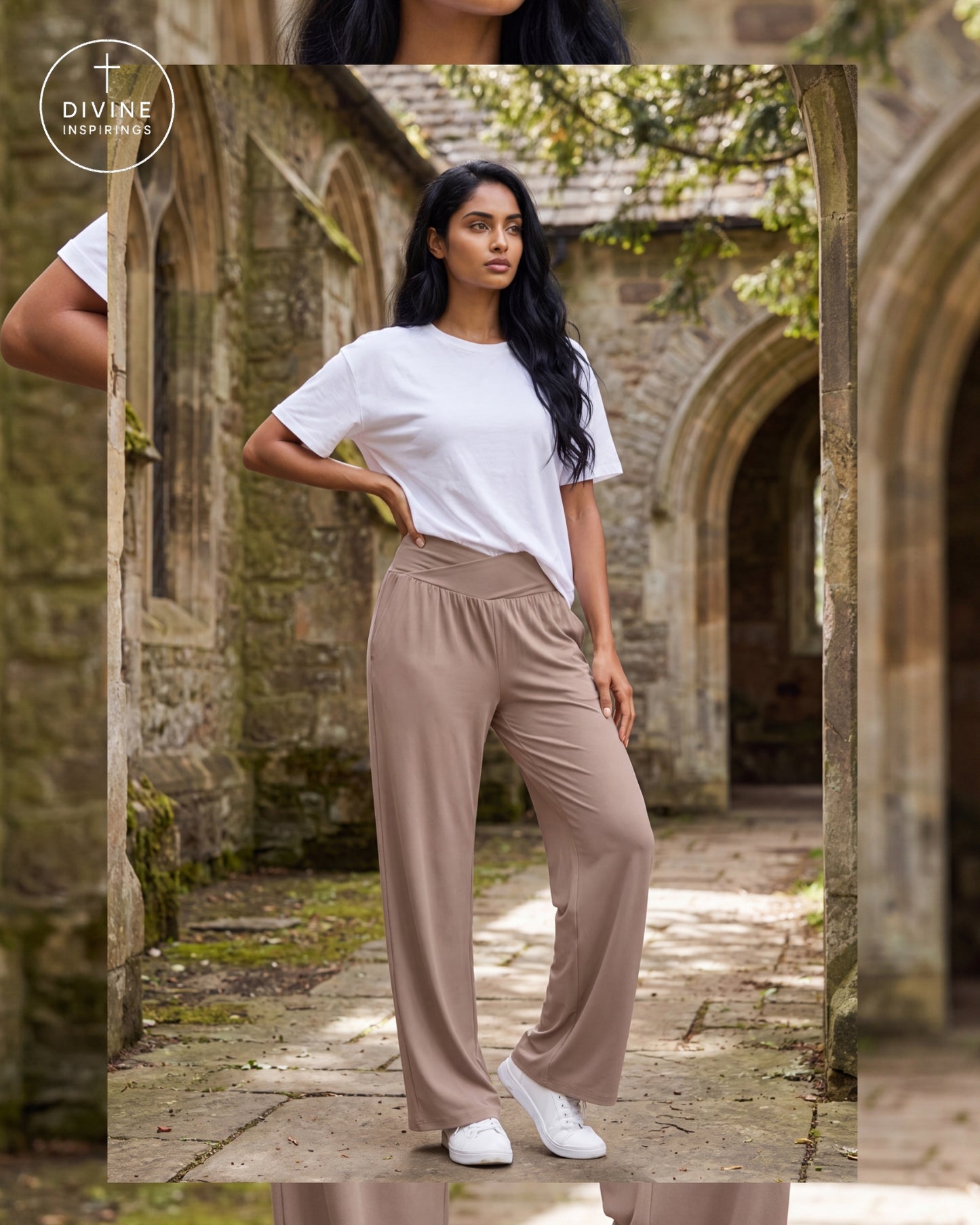A woman stands in a stone courtyard wearing a white short-sleeve t-shirt and high-waisted, wide-leg taupe pants with white sneakers. The image has a vertical mirror reflection on the left and a brand watermark 'Divine Inspirings' in the upper left.