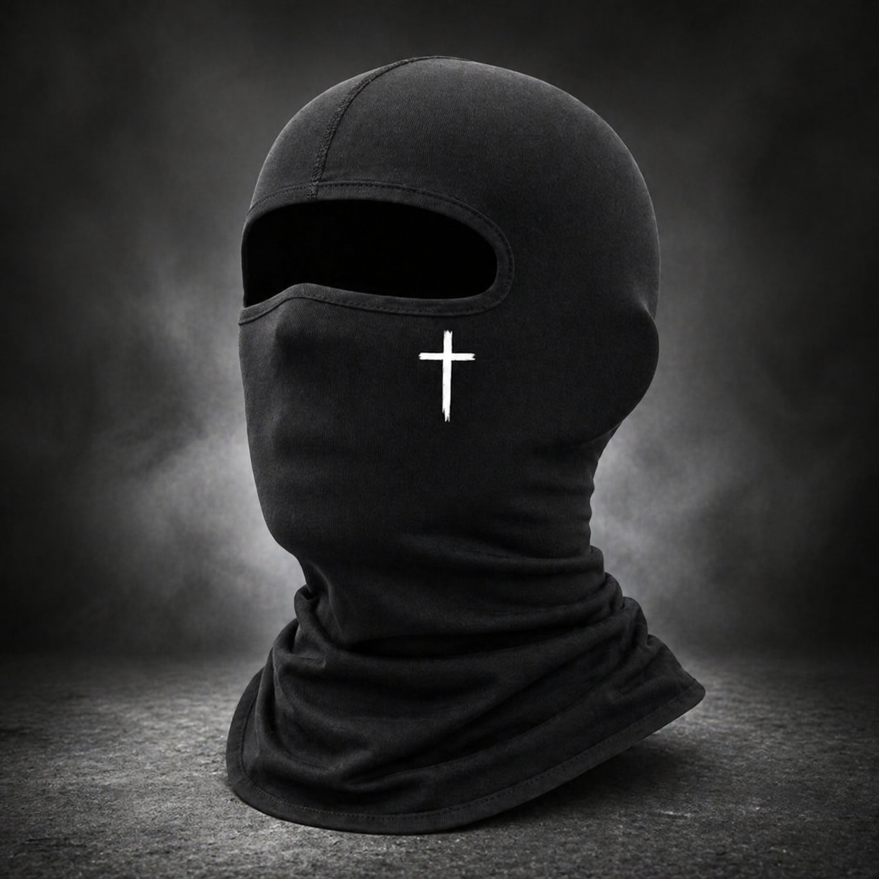 Black balaclava with a white cross on a dark background