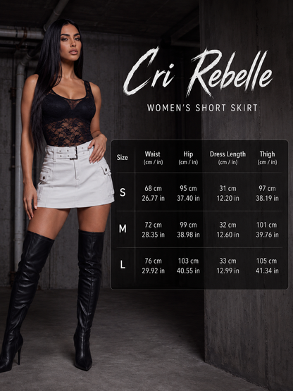 A model wearing a black lace-trimmed short skirt and white high-waisted shorts stands beside a size chart for the Cri Rebelle women's short skirt, with measurements listed for sizes S, M, and L.