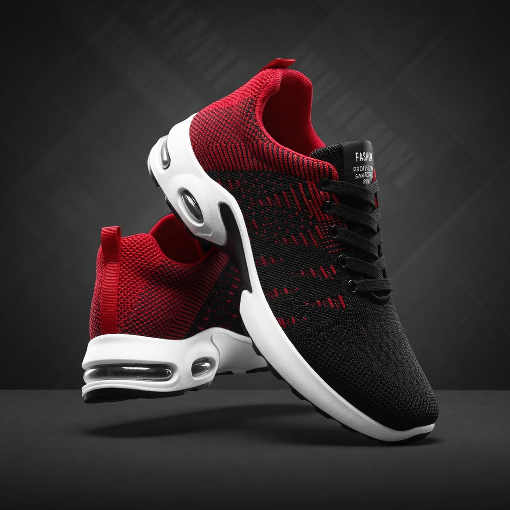 Black and red sneakers with white soles on a dark background