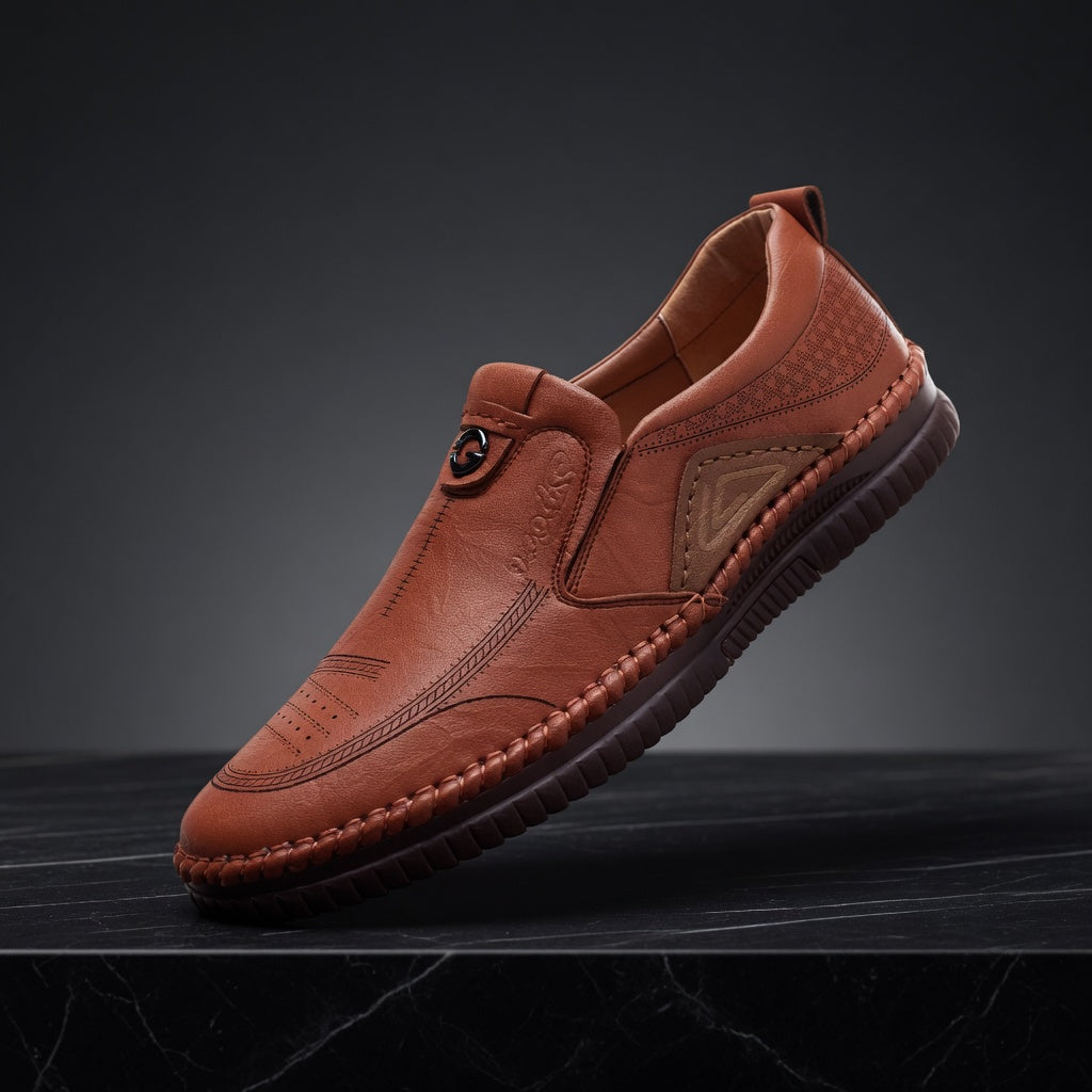 Brown leather shoe on a dark background