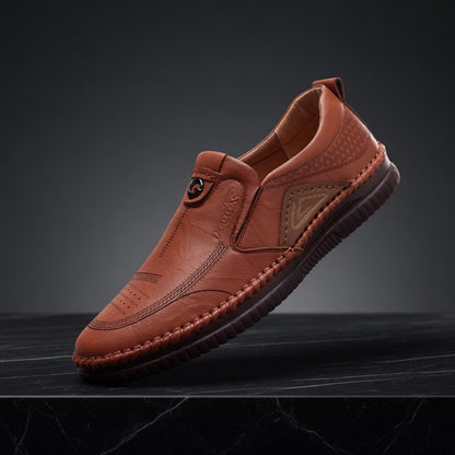 Brown leather shoe on a dark background