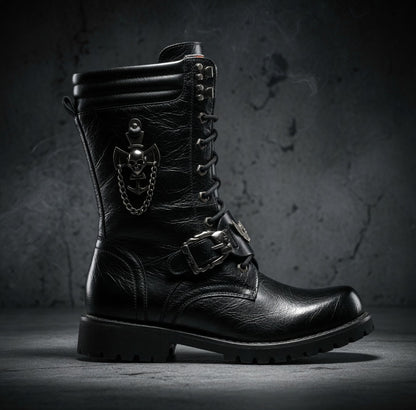 Black leather boot with skull design and chain on a dark background