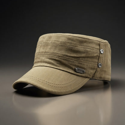 Beige cap with metallic accents on a reflective surface