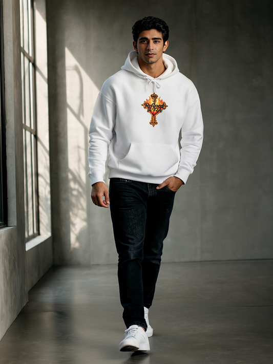 Man wearing a white hoodie with a colorful design walking in a room with large windows.