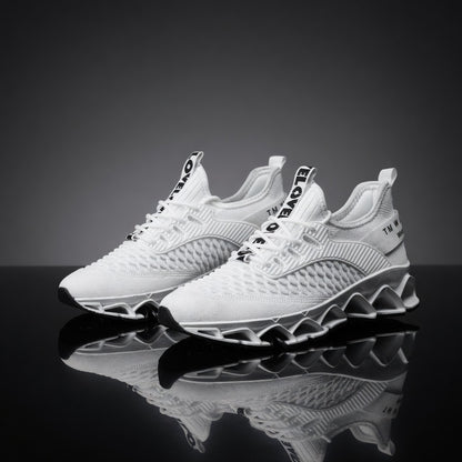White sneakers with brand logo on a reflective black surface and gray background