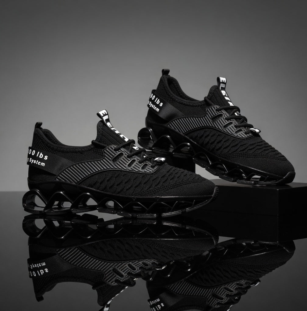 Black athletic shoes on a reflective surface with a dark background