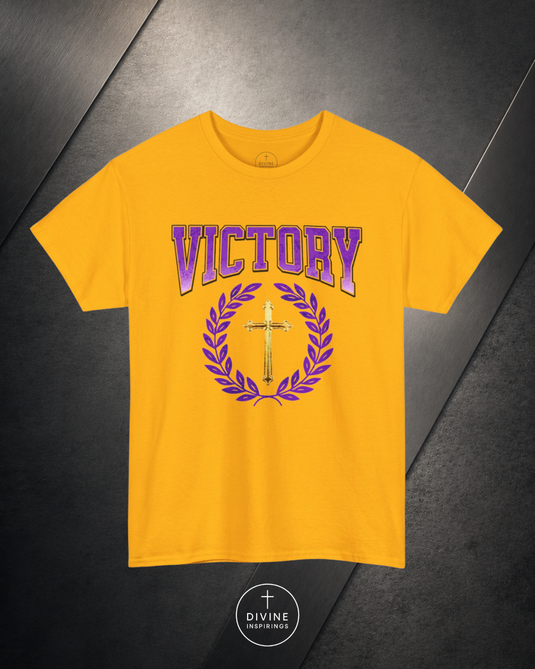 Yellow t-shirt with 'VICTORY' and cross design on a dark background