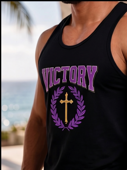 Black tank top with 'VICTORY' and cross design on a blurred beach background
