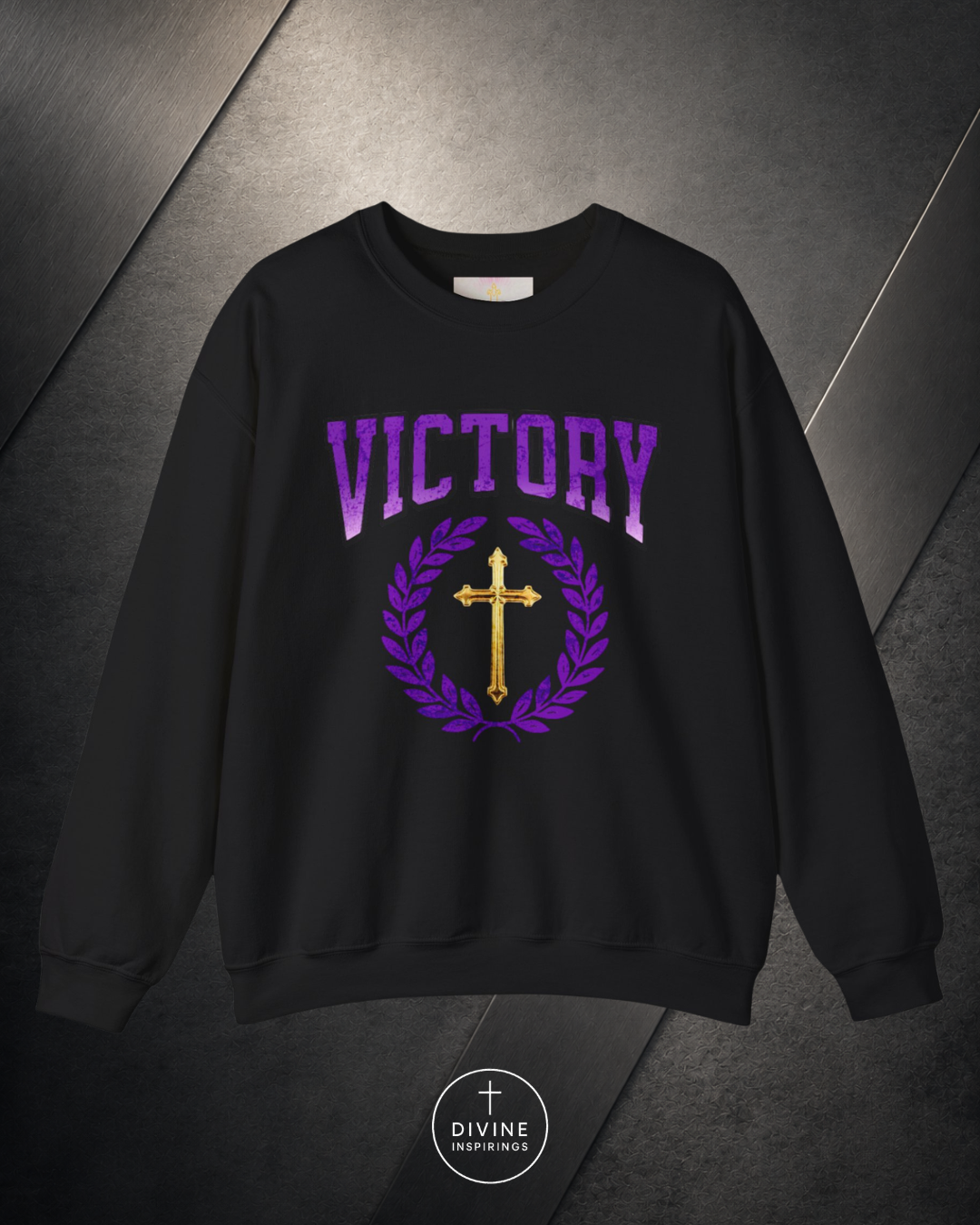 Black sweatshirt with 'VICTORY' and cross design on a dark background