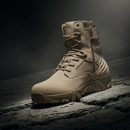 Tan military boot on a dark textured surface