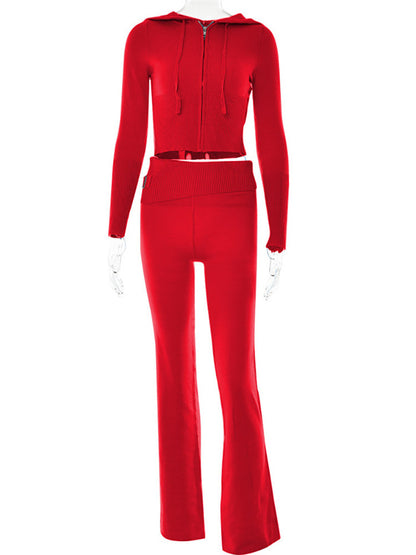 Red tracksuit with a jacket and pants on a white background